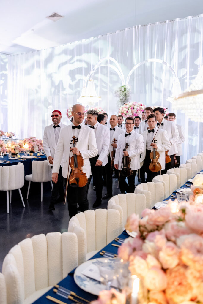 Kiral Artists orchestra performing elegant wedding dinner music at a luxury celebration in Houston, Texas