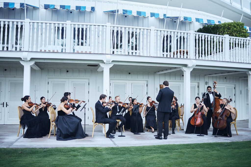 Kiral Artists musicians performing live during a luxury wedding ceremony at the Four Seasons Surfside in Miami